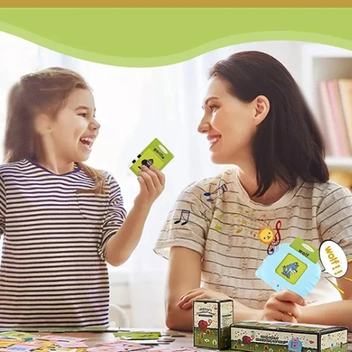 girl playing with older girl with Smarty Cards