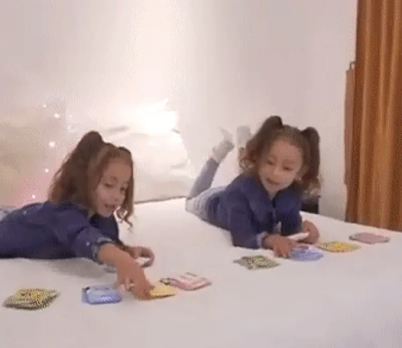 little girls playing with Smarty Cards